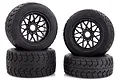 A set of four Rovan Tarmac Buster RC buggy wheels with black mesh rims and beadlock rings, stacked against a white background.