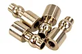 Four small metallic pivot balls for RC cars arranged in a cluster against a white background.