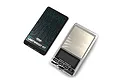 Yeah Racing digital pit scale with a black protective cover featuring a blue circuit board pattern and a silver metal weighing platform.