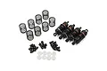 A set of four Yeah Racing 50mm big bore RC shock absorbers with black and dark red components, including extra springs, ball ends, and plastic spacers.