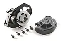 Axial SCX24 complete centre transmission assembly with internal gears, housing cover, and mounting screws on a white background.
