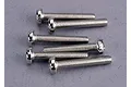 A set of six silver-coloured metal button head screws arranged on a grey surface.