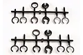 Two identical black plastic parts trees containing various shock spring retainers and spacers for Traxxas RC vehicles.