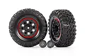 Two Traxxas 2.2 inch Canyon RT tires mounted on black Mercedes-Benz G 63 wheels with red beadlock rings, plus two center caps.