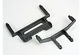 Two black plastic RC car body mounts for Traxxas vehicles, shown from an overhead angle against a plain white background.
