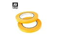 Two rolls of yellow Vallejo precision masking tape stacked on a white background with the Vallejo logo above.