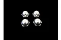 Four silver aluminium closed cap wheel nuts for RC cars arranged in a square on a black background.
