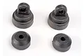 Two black plastic Traxxas Ultra shock caps and two shock bottoms arranged on a white background.