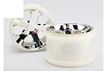 Two Traxxas 2.8 inch All-Star chrome RC monster truck rims against a white background.