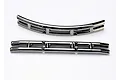 Two black chrome RC car bumpers, one curved and one straight, isolated on a white background.