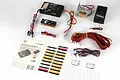 G.T. Power 1/14 scale truck lighting, sound, and vibration system kit including control module, speaker, vibration motor, wiring harnesses, and manual.