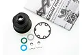 Traxxas differential case set including a black plastic housing, gasket, O-rings, and metal spacers, shown with instruction manual.