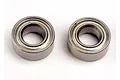Two Traxxas 5x10x4mm metal shielded ball bearings shown side-by-side on a white background.
