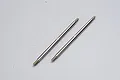 Two silver metal turnbuckle rods for RC vehicles against a plain white background.