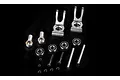 A set of Rovan silver aluminium rear hub components including two hubs, ball joints, bearings, pins, screws, and e-clips on a black background.