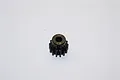 A black 14T 1Mod pinion gear for an RC car, shown from a top-down angle on a white background.