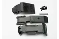Traxxas front and rear skid plate set for RC vehicles, including three black plastic skid plates and a set of mounting screws on a white background.