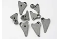 A collection of eight grey plastic Traxxas progressive rocker arms arranged on a white background.