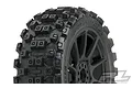 A close-up of a Pro-Line Badlands MX tyre mounted on a black Mach 10 rim, showing the aggressive tread pattern and wheel design.