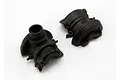 Two black plastic differential housing halves for a Traxxas RC vehicle, shown from a top-down perspective on a white background.