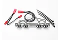 Traxxas Summit LED light bar kit featuring four chrome-finished light buckets on a mounting bracket with wiring harness and zip ties.