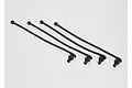 Four black silicone body pin retainers for RC cars arranged diagonally on a white background.