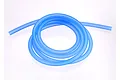 A coil of translucent blue silicone water cooling tubing for RC boats on a white background.