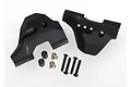 Traxxas front suspension arm guards in black plastic with included mounting screws and spacers on a white background.