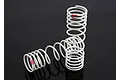 Two white Traxxas RC shock springs with pink identification markings on a black background.
