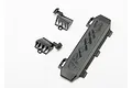 Traxxas battery door and two vent covers in black plastic, shown on a white background.