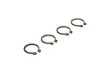 Four ARRMA 15mm C-clips arranged in a diagonal line against a white background.