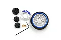 Yeah Racing transmitter steering wheel upgrade kit including a blue rim, brake disc, caliper, adapters, screws, and hex key on a white background.
