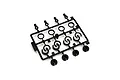 A black plastic parts tree containing various shock spacers and clips for an RC car, set against a plain white background.