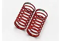 Two red Traxxas 1/16 GTR shock springs with double green identification markings on a white background.