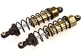 Two gold-coloured RC shock absorbers with black springs and black plastic ends, shown against a white background.