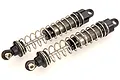 Two assembled RC shock absorbers with black plastic ends and silver metal springs against a white background.