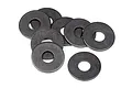A small pile of eight dark grey metal washers on a white background.