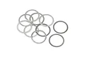 A pile of ten thin, circular metal washers on a white background.