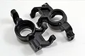 Two black RPM steering blocks for the Traxxas X-Maxx RC truck, shown from a top-down angle on a white background.