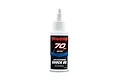 A bottle of Traxxas 70wt silicone shock oil, featuring a white cap and a black and blue label with the Traxxas logo.