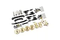 A complete metal upgrade set for the SCX24 RC crawler, including brass wheel weights, black suspension links, shocks, and various hardware components.