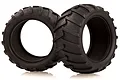 Two black rubber RC off-road tyres with V-groove tread patterns, shown against a white background.