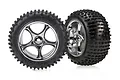 Two Traxxas 2.2 inch Bandit rear Alias tyres mounted on chrome Tracer rims, shown against a white background.