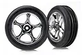 Two Traxxas 2.2 inch Alias ribbed tires pre-mounted on chrome five-spoke Tracer wheels against a white background.