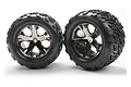 Two Traxxas 2.8 inch Talon tires pre-mounted on black chrome All-Star wheels, viewed from the front against a white background.