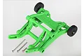 A bright green Traxxas RC wheelie bar assembly with two small black wheels and three metal screws on a white background.