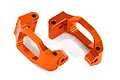 Two bright orange anodized aluminium hub carriers for a Traxxas 1/10 Maxx RC car, shown against a plain white background.