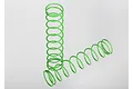 Two bright green coil springs for RC car suspension, positioned with one standing upright and one lying horizontally on a white surface.