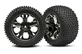 Two Traxxas 2.8 inch Alias tyres mounted on black chrome All-Star rims, shown from front and side angles against a white background.