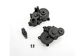 Traxxas gearbox halves set including two main housing pieces, a small plastic component, and two small screws on a white background.